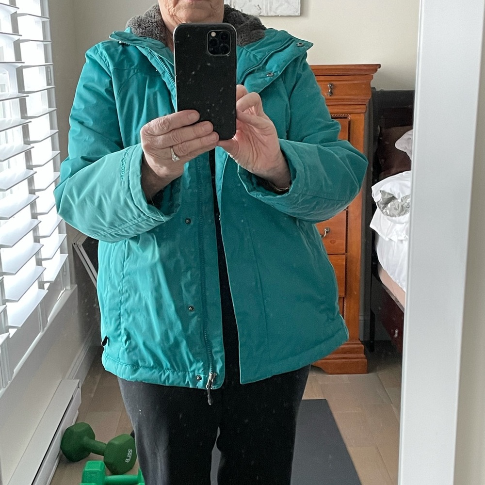 Teal colored LL Bean winter jacket.